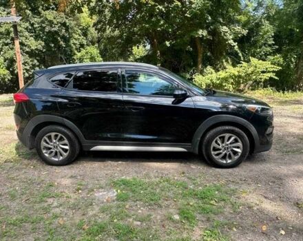 Черный Хендай Туксон, объемом двигателя 2 л и пробегом 83 тыс. км за 4400 $, фото 1 на Automoto.ua
