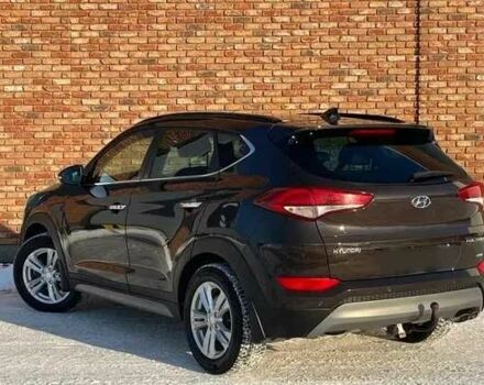 Чорний Хендай Туксон, об'ємом двигуна 2 л та пробігом 131 тис. км за 10400 $, фото 3 на Automoto.ua
