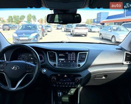 Черный Хендай Туксон, объемом двигателя 2 л и пробегом 98 тыс. км за 24000 $, фото 16 на Automoto.ua