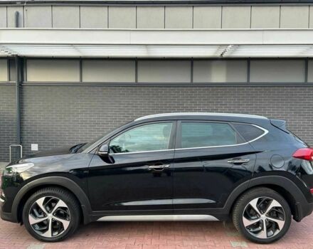 Чорний Хендай Туксон, об'ємом двигуна 1.7 л та пробігом 98 тис. км за 14000 $, фото 4 на Automoto.ua