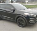 Чорний Хендай Туксон, об'ємом двигуна 2 л та пробігом 143 тис. км за 18000 $, фото 2 на Automoto.ua