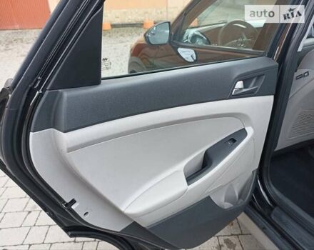 Черный Хендай Туксон, объемом двигателя 2 л и пробегом 107 тыс. км за 14800 $, фото 17 на Automoto.ua