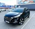 Черный Хендай Туксон, объемом двигателя 2 л и пробегом 98 тыс. км за 24000 $, фото 1 на Automoto.ua
