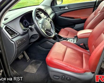 Черный Хендай Туксон, объемом двигателя 2 л и пробегом 123 тыс. км за 15900 $, фото 6 на Automoto.ua