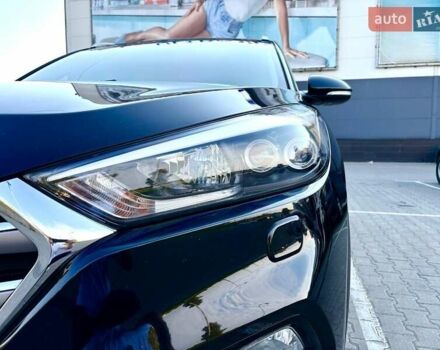 Черный Хендай Туксон, объемом двигателя 2 л и пробегом 98 тыс. км за 24000 $, фото 4 на Automoto.ua