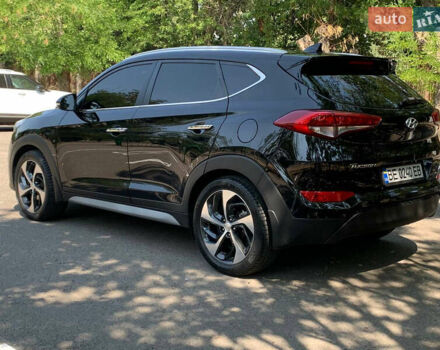 Черный Хендай Туксон, объемом двигателя 2 л и пробегом 122 тыс. км за 19800 $, фото 6 на Automoto.ua