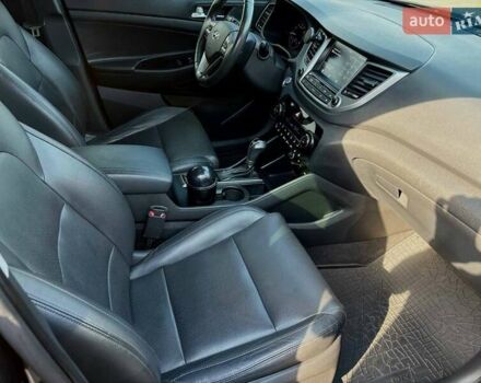 Черный Хендай Туксон, объемом двигателя 2 л и пробегом 98 тыс. км за 24000 $, фото 18 на Automoto.ua