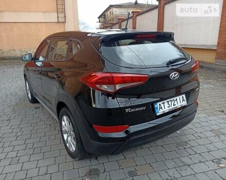 Черный Хендай Туксон, объемом двигателя 2 л и пробегом 107 тыс. км за 14800 $, фото 7 на Automoto.ua