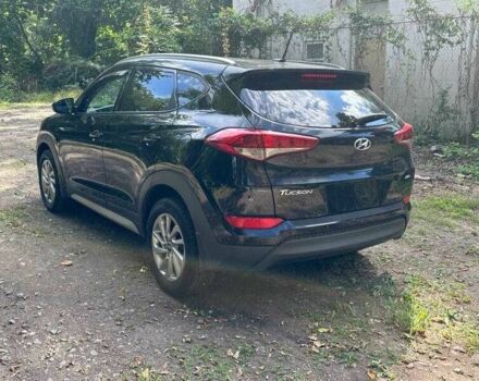 Черный Хендай Туксон, объемом двигателя 2 л и пробегом 83 тыс. км за 4400 $, фото 4 на Automoto.ua