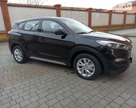 Черный Хендай Туксон, объемом двигателя 2 л и пробегом 107 тыс. км за 14800 $, фото 2 на Automoto.ua