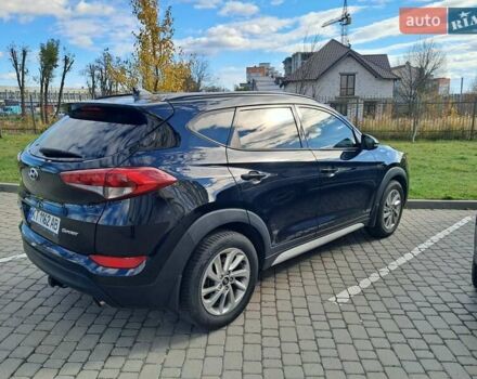 Черный Хендай Туксон, объемом двигателя 2 л и пробегом 126 тыс. км за 16600 $, фото 1 на Automoto.ua