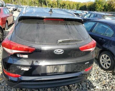 Чорний Хендай Туксон, об'ємом двигуна 2 л та пробігом 45 тис. км за 10000 $, фото 4 на Automoto.ua