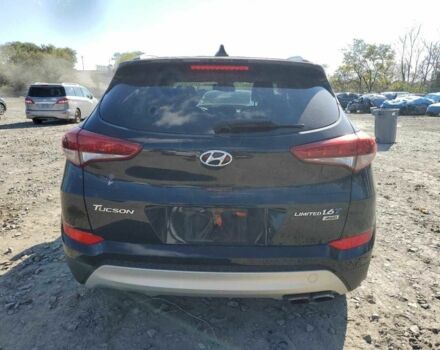 Черный Хендай Туксон, объемом двигателя 1.6 л и пробегом 157 тыс. км за 2600 $, фото 5 на Automoto.ua