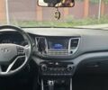 Черный Хендай Туксон, объемом двигателя 2 л и пробегом 113 тыс. км за 15500 $, фото 1 на Automoto.ua