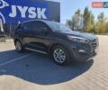 Черный Хендай Туксон, объемом двигателя 2 л и пробегом 168 тыс. км за 16400 $, фото 1 на Automoto.ua