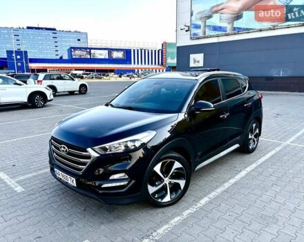Черный Хендай Туксон, объемом двигателя 2 л и пробегом 98 тыс. км за 24000 $, фото 1 на Automoto.ua