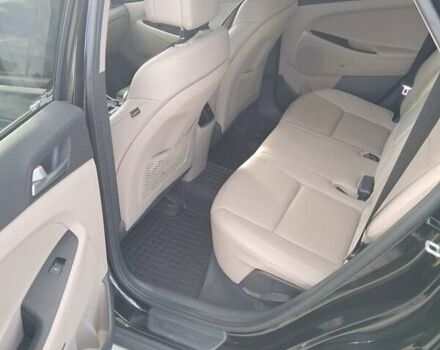 Черный Хендай Туксон, объемом двигателя 2 л и пробегом 126 тыс. км за 16600 $, фото 3 на Automoto.ua