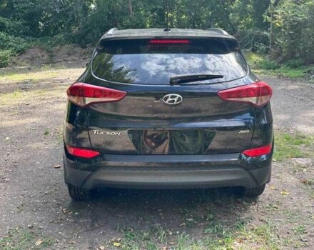 Черный Хендай Туксон, объемом двигателя 2 л и пробегом 83 тыс. км за 4400 $, фото 3 на Automoto.ua