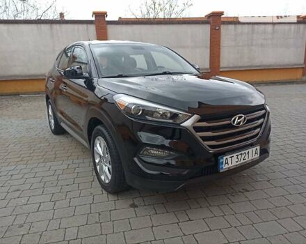 Черный Хендай Туксон, объемом двигателя 2 л и пробегом 107 тыс. км за 14800 $, фото 1 на Automoto.ua