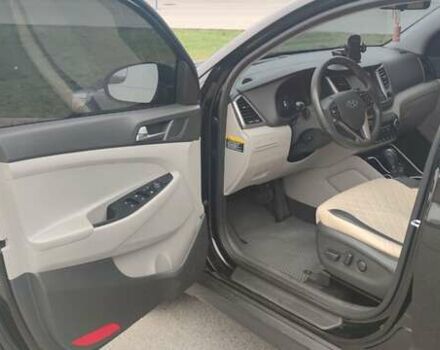 Чорний Хендай Туксон, об'ємом двигуна 2 л та пробігом 143 тис. км за 18000 $, фото 10 на Automoto.ua