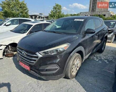 Чорний Хендай Туксон, об'ємом двигуна 2 л та пробігом 119 тис. км за 11700 $, фото 1 на Automoto.ua