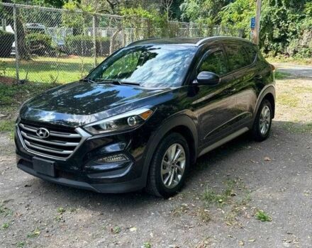 Черный Хендай Туксон, объемом двигателя 2 л и пробегом 83 тыс. км за 4400 $, фото 6 на Automoto.ua