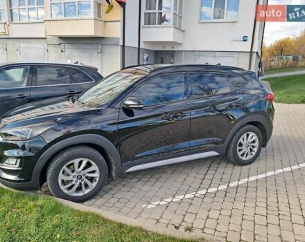 Черный Хендай Туксон, объемом двигателя 2 л и пробегом 126 тыс. км за 16600 $, фото 6 на Automoto.ua