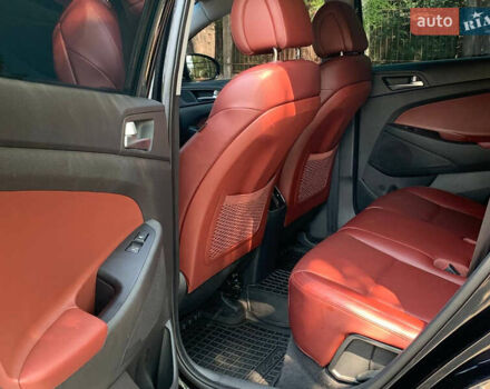 Черный Хендай Туксон, объемом двигателя 2 л и пробегом 122 тыс. км за 19800 $, фото 8 на Automoto.ua