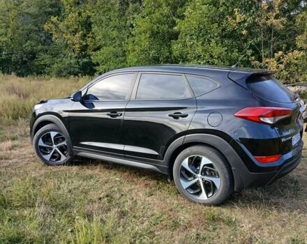 Чорний Хендай Туксон, об'ємом двигуна 2 л та пробігом 148 тис. км за 17800 $, фото 5 на Automoto.ua