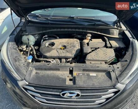 Чорний Хендай Туксон, об'ємом двигуна 2 л та пробігом 119 тис. км за 11700 $, фото 11 на Automoto.ua