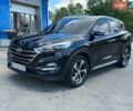 Чорний Хендай Туксон, об'ємом двигуна 2 л та пробігом 132 тис. км за 18000 $, фото 1 на Automoto.ua