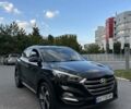 Черный Хендай Туксон, объемом двигателя 2 л и пробегом 148 тыс. км за 19500 $, фото 4 на Automoto.ua