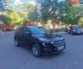 Черный Хендай Туксон, объемом двигателя 2 л и пробегом 76 тыс. км за 15500 $, фото 1 на Automoto.ua