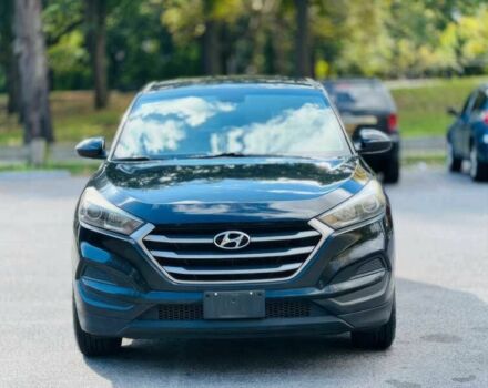 Черный Хендай Туксон, объемом двигателя 2 л и пробегом 60 тыс. км за 13500 $, фото 1 на Automoto.ua