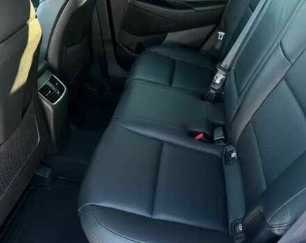 Чорний Хендай Туксон, об'ємом двигуна 2 л та пробігом 131 тис. км за 10400 $, фото 12 на Automoto.ua