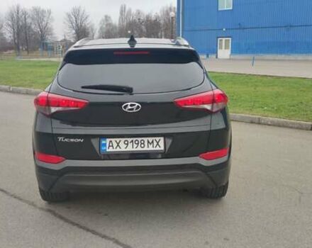 Чорний Хендай Туксон, об'ємом двигуна 2 л та пробігом 143 тис. км за 18000 $, фото 5 на Automoto.ua