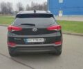 Чорний Хендай Туксон, об'ємом двигуна 2 л та пробігом 143 тис. км за 18000 $, фото 5 на Automoto.ua