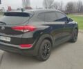 Чорний Хендай Туксон, об'ємом двигуна 2 л та пробігом 143 тис. км за 18000 $, фото 4 на Automoto.ua