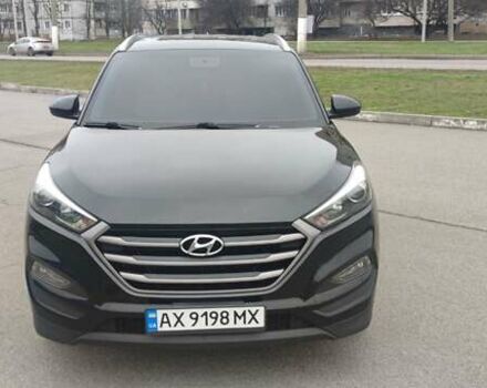 Чорний Хендай Туксон, об'ємом двигуна 2 л та пробігом 143 тис. км за 18000 $, фото 6 на Automoto.ua