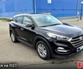 Черный Хендай Туксон, объемом двигателя 2 л и пробегом 123 тыс. км за 15900 $, фото 1 на Automoto.ua