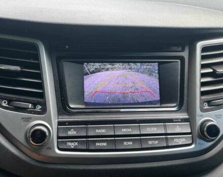 Черный Хендай Туксон, объемом двигателя 2 л и пробегом 83 тыс. км за 4400 $, фото 11 на Automoto.ua