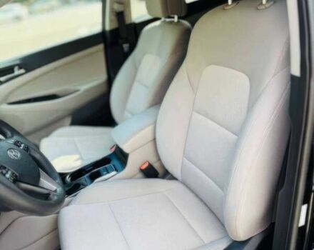 Черный Хендай Туксон, объемом двигателя 2 л и пробегом 60 тыс. км за 13500 $, фото 8 на Automoto.ua