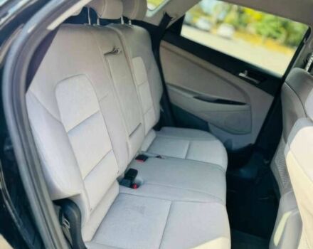 Черный Хендай Туксон, объемом двигателя 2 л и пробегом 60 тыс. км за 13500 $, фото 11 на Automoto.ua