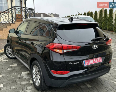 Черный Хендай Туксон, объемом двигателя 2 л и пробегом 156 тыс. км за 12800 $, фото 24 на Automoto.ua