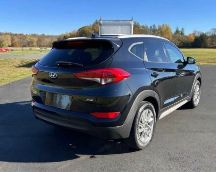 Чорний Хендай Туксон, об'ємом двигуна 2 л та пробігом 48 тис. км за 10800 $, фото 6 на Automoto.ua