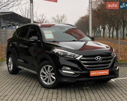 Черный Хендай Туксон, объемом двигателя 2 л и пробегом 106 тыс. км за 19500 $, фото 2 на Automoto.ua