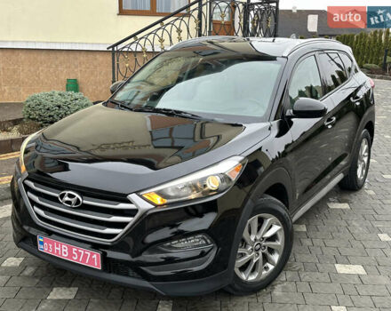 Черный Хендай Туксон, объемом двигателя 2 л и пробегом 156 тыс. км за 12800 $, фото 9 на Automoto.ua