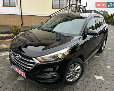 Черный Хендай Туксон, объемом двигателя 2 л и пробегом 156 тыс. км за 12800 $, фото 15 на Automoto.ua