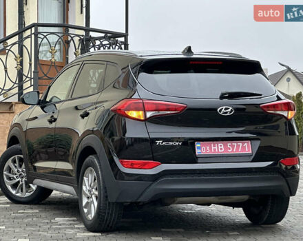 Черный Хендай Туксон, объемом двигателя 2 л и пробегом 156 тыс. км за 12800 $, фото 21 на Automoto.ua