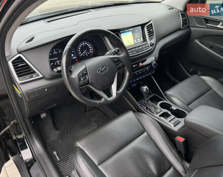 Черный Хендай Туксон, объемом двигателя 1.69 л и пробегом 134 тыс. км за 21800 $, фото 18 на Automoto.ua